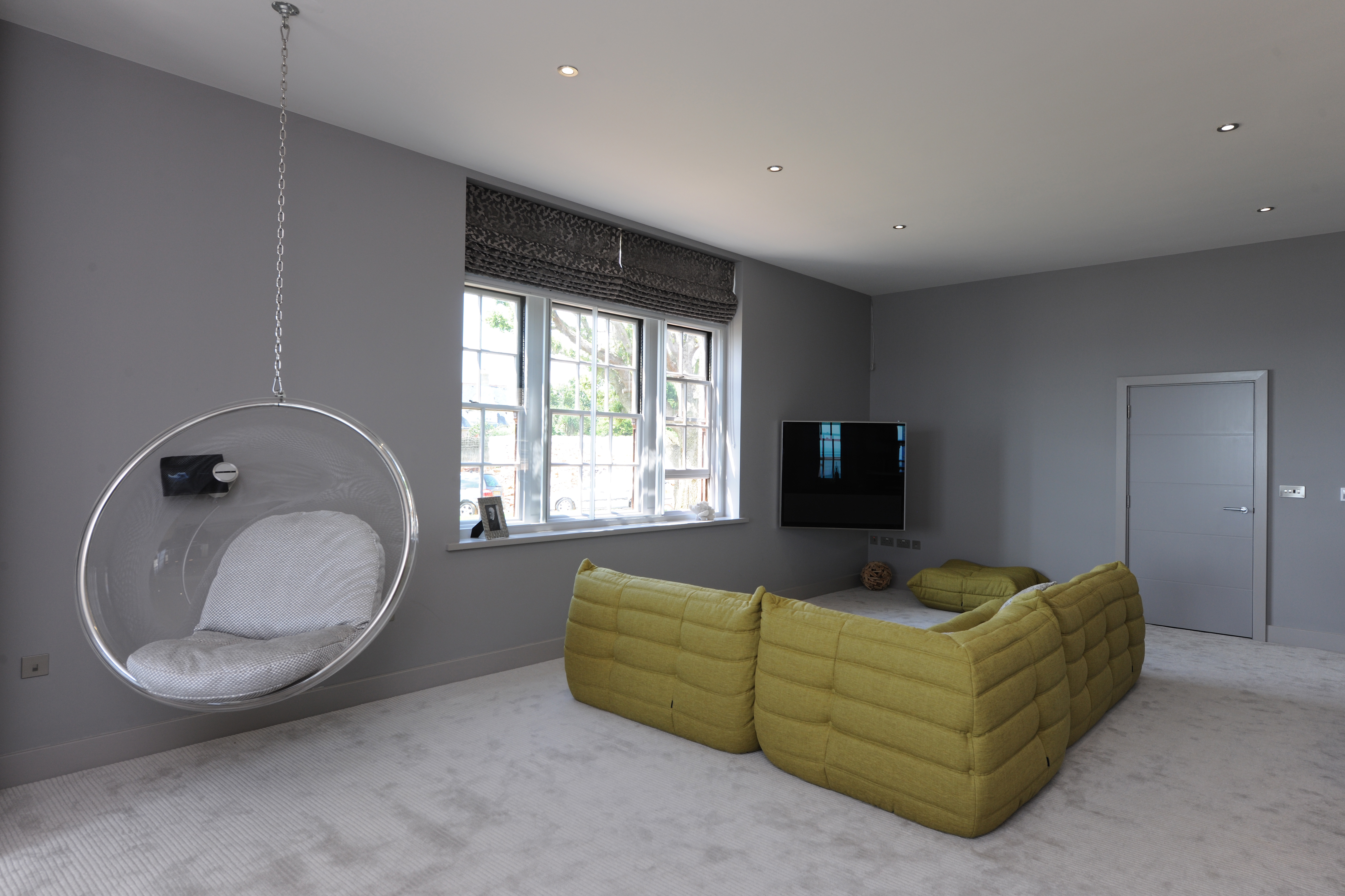 A warm and quiet environment whilst relaxing in the living room, made possible with Selectaglaze secondary glazing