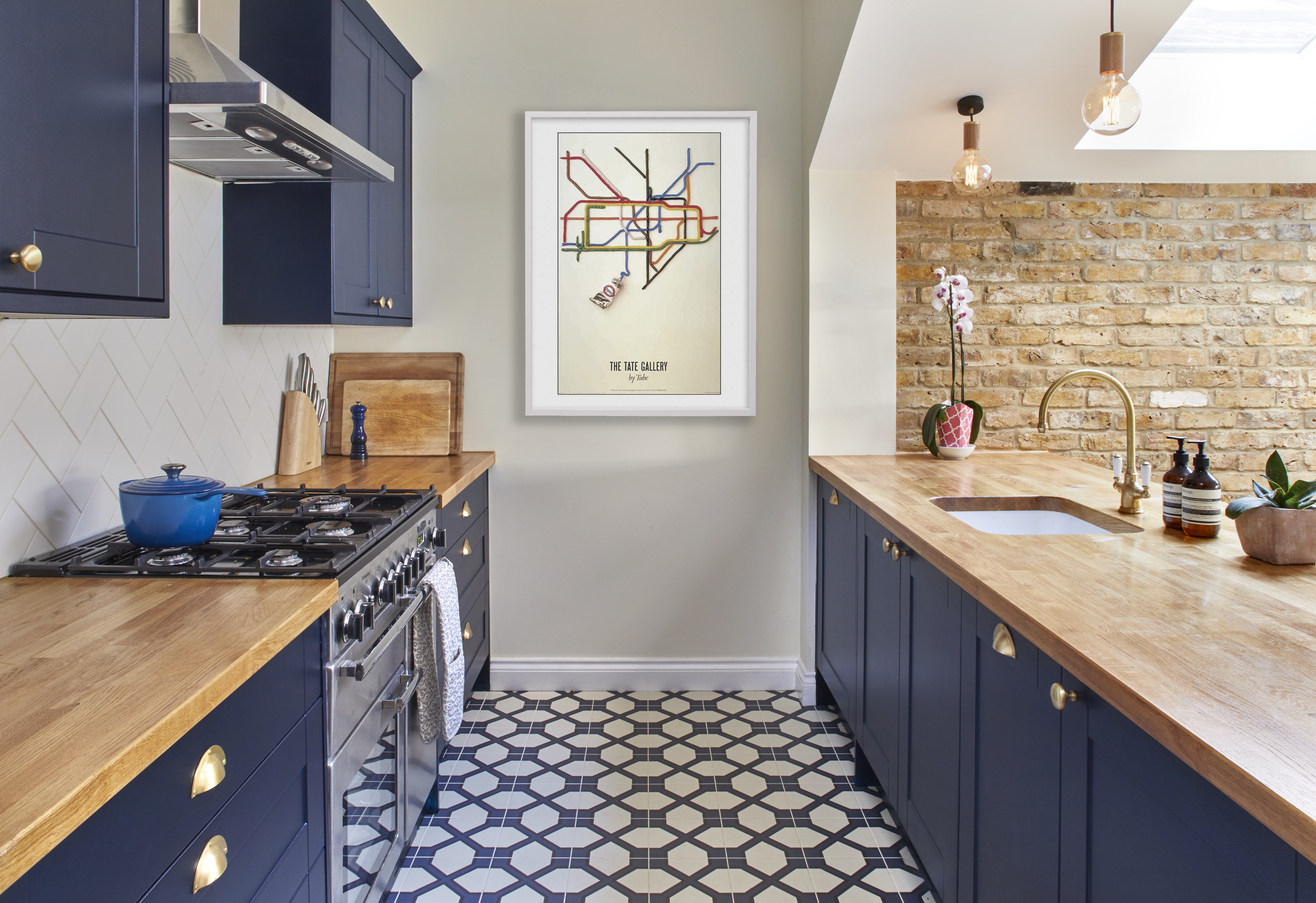 Bespoke farmhouse style kitchen with dark blue shaker cabinets made for West London client by Holland Street Kitchens.