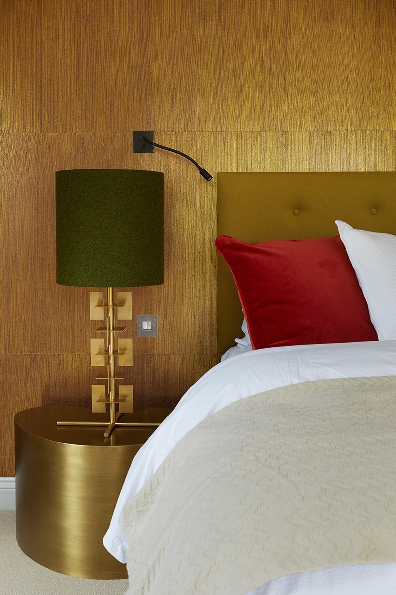 Master Bedroom; Gold wall paper; Gold bedside lamp; Gold bedside table; Missoni cushions; Bespoke British bed