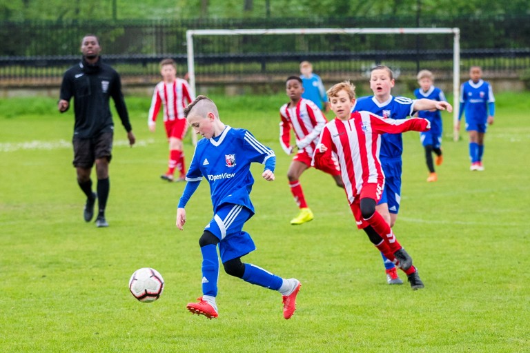 Boys playing football