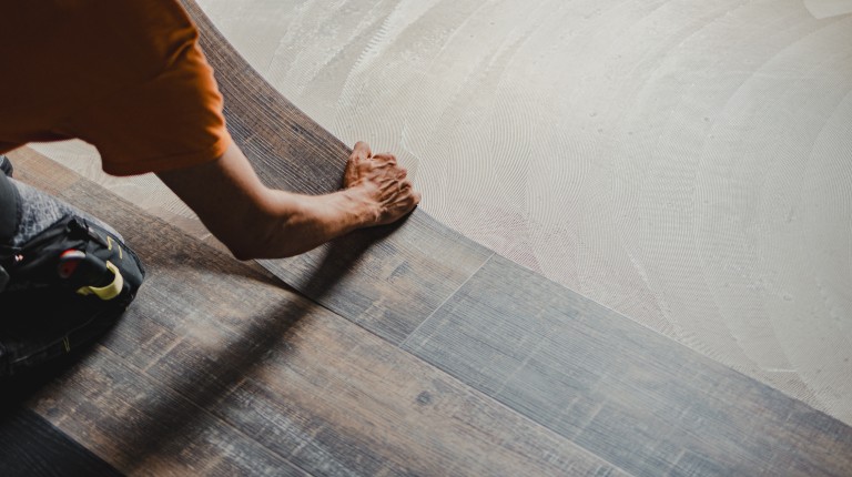 Man Laying Flooring