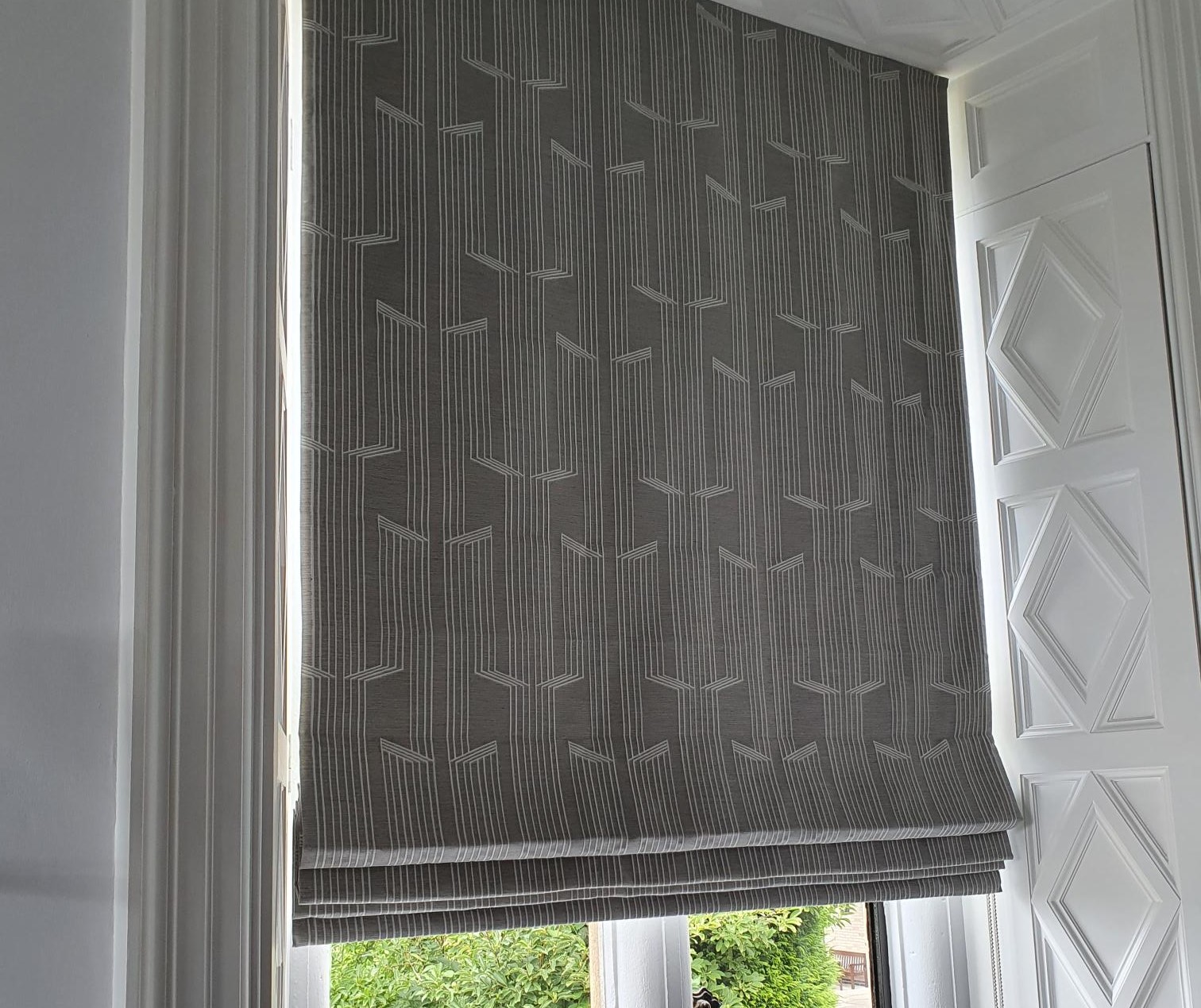 Elegant Oru Roman blind to add layers into the suites.
