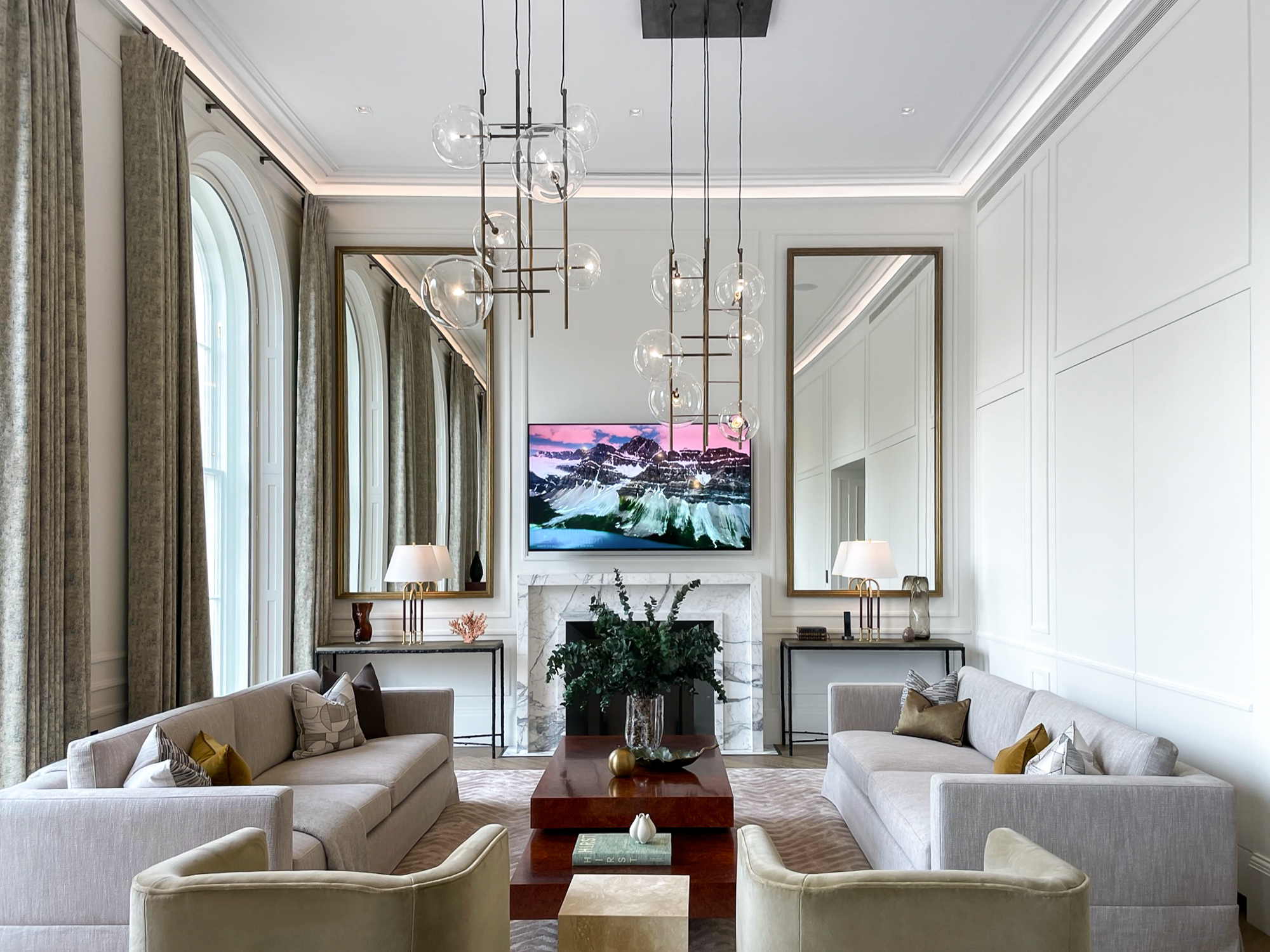 A luxury living room in Regents Park Crescent featuring a Control4 System, Lutron lighting control and a Sony TV.