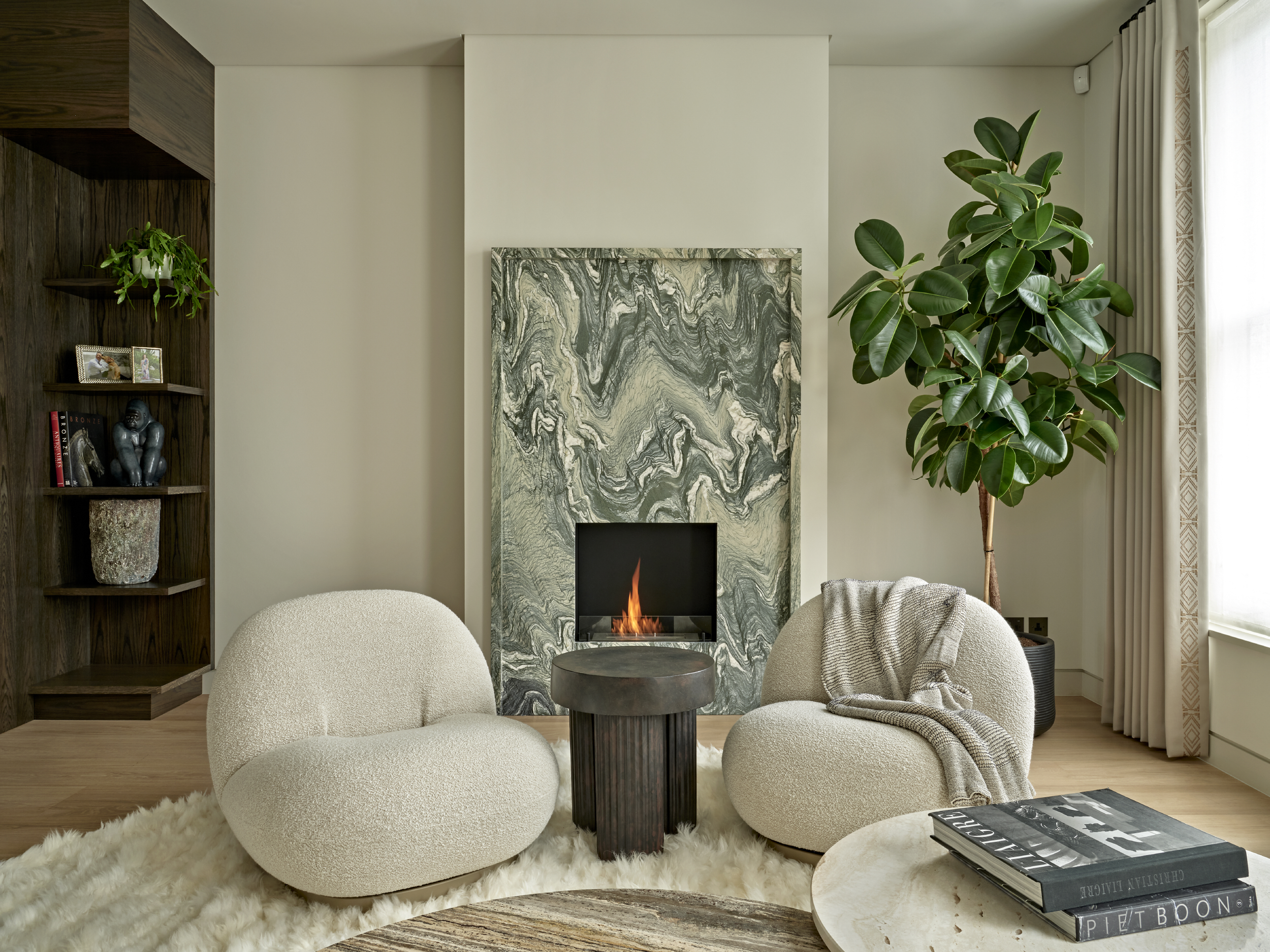 A statement green marble fireplace 