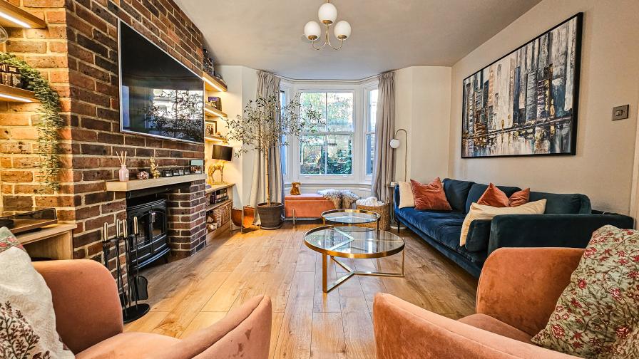 Living Room with Brick Fireplace