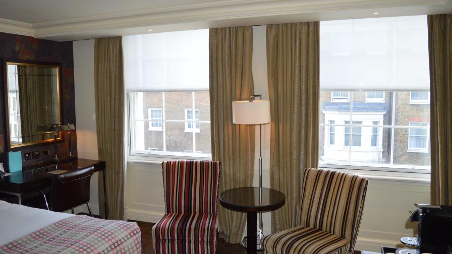 Matching pair of windows in the Arch Hotel London, treated with secondary gazing and blinds re hung in front.