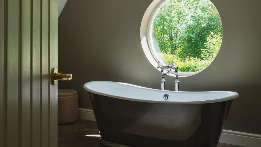 Porthole window, free-standing bath