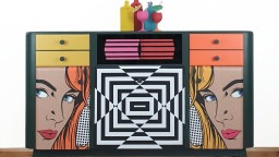An upcycled mid-century sideboard decoupaged in a pop art design