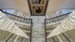 Calacatta marble double flight staircase in Millgate development