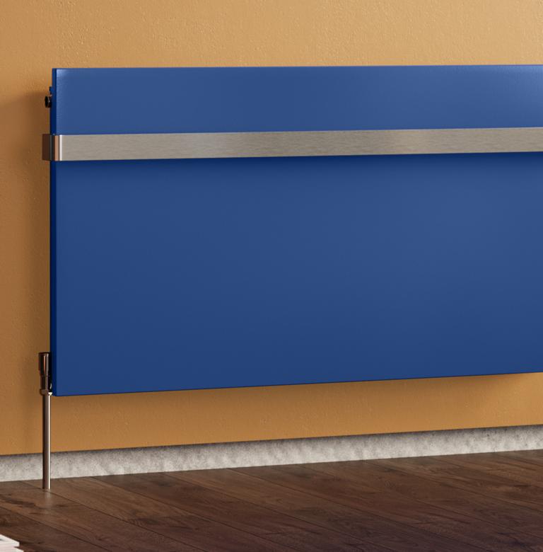 Blue radiator against an orange wall.