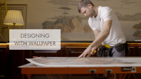 Craftsman cutting wallpaper with CPD title to the left