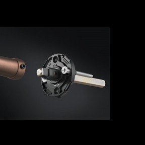 A dark coloured door handle with black background